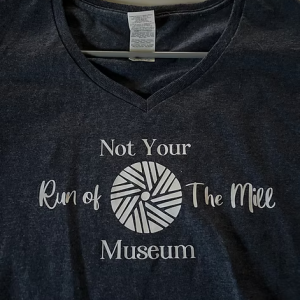 T-Shirt: V-Neck -  Not Your Average Run of the Mill Museum